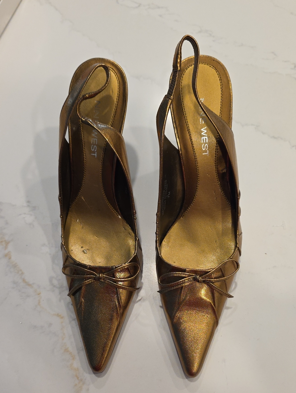 Nine West Bronze Pointed-Toe Slingback Leather Pumps with Bow. Size 7; 4" Heals